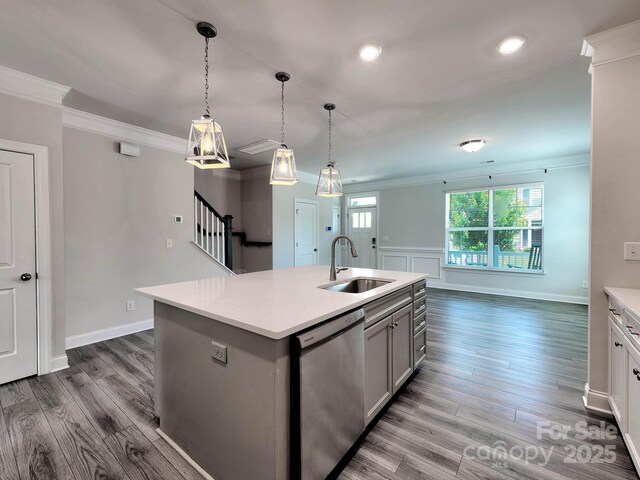 2001 Laurel Village Cir, Belmont, NC 28012 - kitchen featuring stainless steel dishwasher, a sink, crown molding, light countertops, and dark wood finished floors