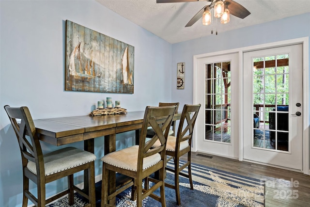 174 Sassafras Hill Dr Unit 41, Rutherfordton, NC 28139 - dining area featuring wood finished floors, a ceiling fan, and a textured ceiling