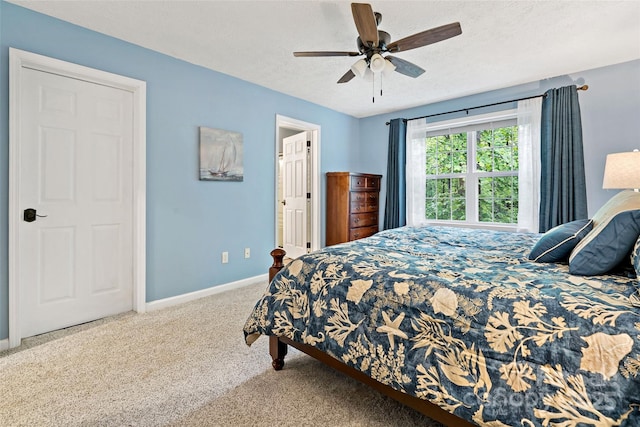 174 Sassafras Hill Dr Unit 41, Rutherfordton, NC 28139 - bedroom with carpet flooring, baseboards, a textured ceiling, and a ceiling fan