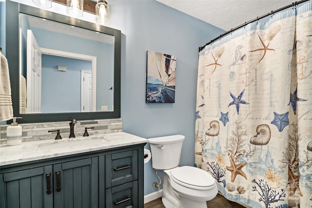 174 Sassafras Hill Dr Unit 41, Rutherfordton, NC 28139 - full bathroom featuring a textured ceiling, vanity, toilet, backsplash, and wood finished floors