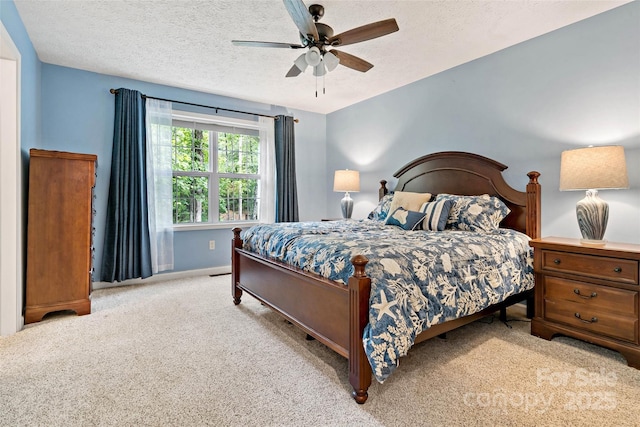174 Sassafras Hill Dr Unit 41, Rutherfordton, NC 28139 - bedroom featuring carpet floors, baseboards, a textured ceiling, and ceiling fan
