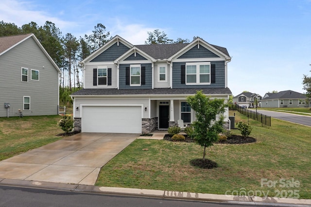 craftsman-style home featuring a garage, covered porch, concrete driveway, and a front yard