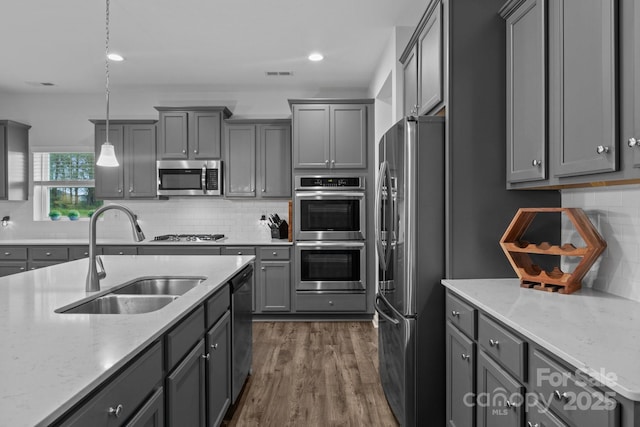 7604 Tanglewood Way, Denver, NC 28037 - kitchen featuring stainless steel appliances, gray cabinetry, tasteful backsplash, dark wood-style floors, and recessed lighting