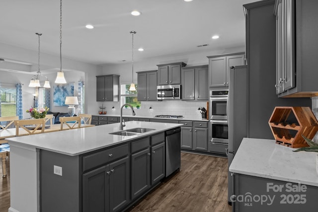 7604 Tanglewood Way, Denver, NC 28037 - kitchen featuring stainless steel appliances, gray cabinets, dark wood-type flooring, tasteful backsplash, and recessed lighting