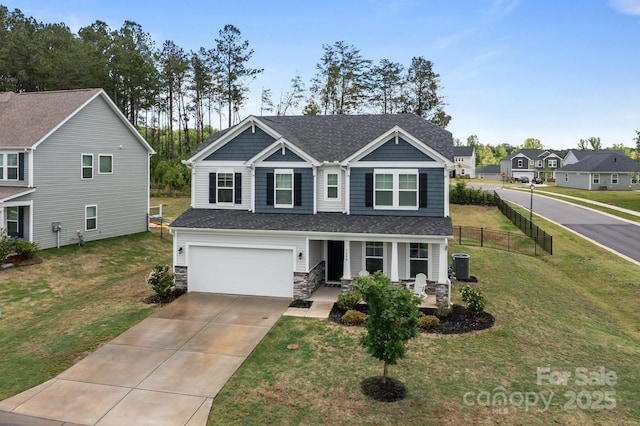 7604 Tanglewood Way, Denver, NC 28037 - view of front of home featuring a porch, driveway, stone siding, a garage, and a shingled roof