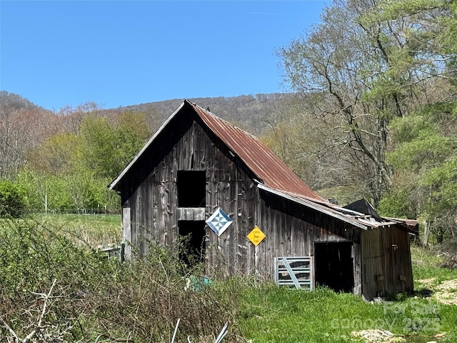 40 Painter Rd, Banner Elk, NC 28604 - view of barn with a wooded view