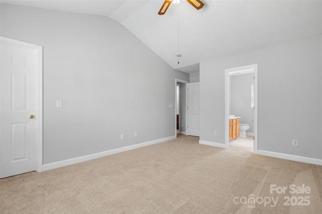 4004 Shasta Cir, Clover, SC 29710 - unfurnished bedroom with vaulted ceiling, light carpet, connected bathroom, baseboards, and a ceiling fan