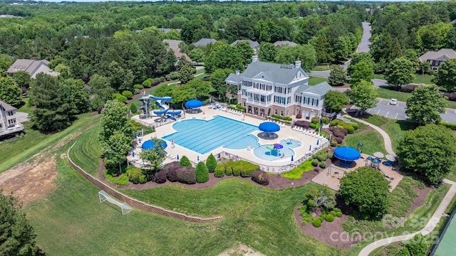 4028 Woodsmill Rd, Fort Mill, SC 29707 - bird's eye view of a pool area and a heavily wooded area