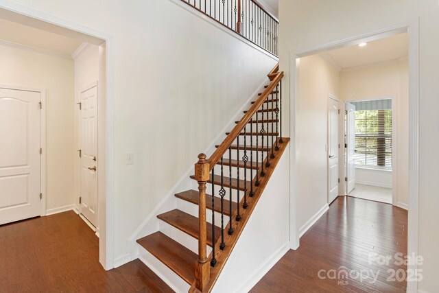 4028 Woodsmill Rd, Fort Mill, SC 29707 - stairs with ornamental molding, wood finished floors, and baseboards