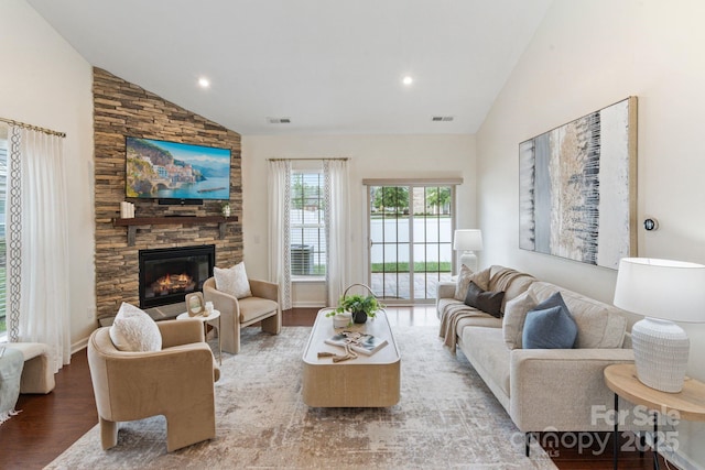 4028 Woodsmill Rd, Fort Mill, SC 29707 - living room with high vaulted ceiling, a stone fireplace, wood finished floors, and recessed lighting