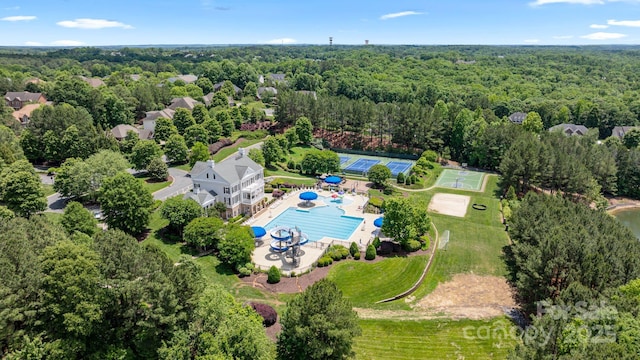 4028 Woodsmill Rd, Fort Mill, SC 29707 - drone / aerial view of a pool area and a forest