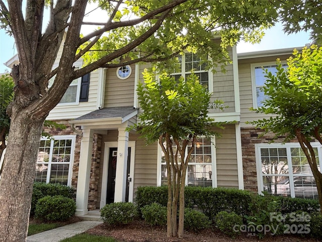 view of front of home featuring stone siding