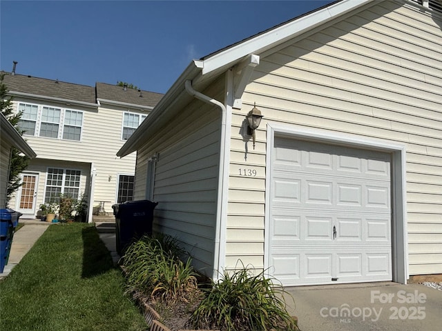 view of property exterior with a yard