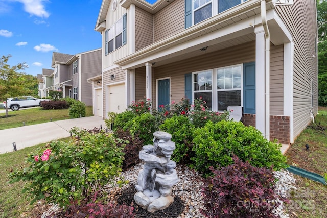 9132 Colwick Hill Ln, Charlotte, NC 28215 - view of side of property featuring an attached garage and driveway