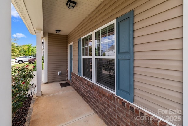 9132 Colwick Hill Ln, Charlotte, NC 28215 - view of patio featuring covered porch