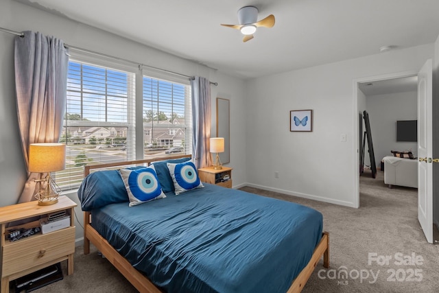 9132 Colwick Hill Ln, Charlotte, NC 28215 - carpeted bedroom with baseboards and ceiling fan
