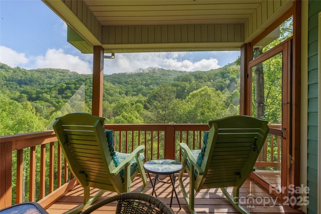 332 Mystic Cv, Waynesville, NC 28785 - wooden terrace featuring a forest view