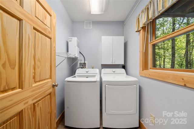 332 Mystic Cv, Waynesville, NC 28785 - laundry area with cabinet space and separate washer and dryer