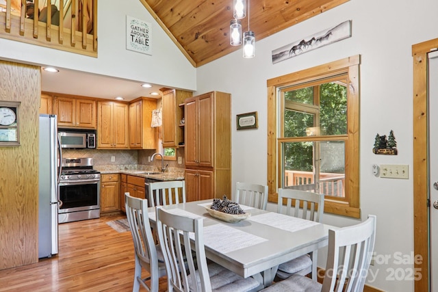 332 Mystic Cv, Waynesville, NC 28785 - dining room with light wood-style floors, wood ceiling, and high vaulted ceiling
