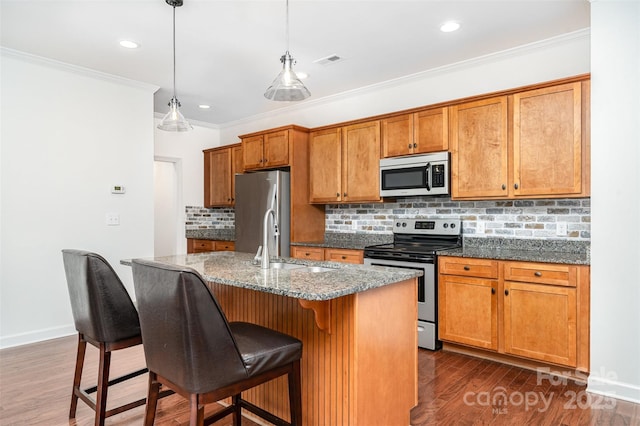 6033 Bountiful St Unit 201, Belmont, NC 28012 - kitchen with appliances with stainless steel finishes, a sink, dark wood-style flooring, brown cabinets, and ornamental molding