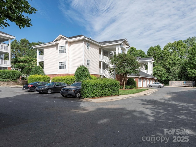 8747 Coralbell Ln, Charlotte, NC 28213 - view of property with uncovered parking
