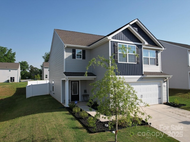 3322 Brighton Dr, Gastonia, NC 28052 - view of front facade featuring board and batten siding, a garage, and driveway