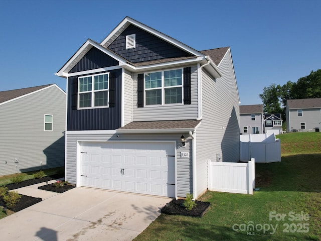 3322 Brighton Dr, Gastonia, NC 28052 - view of front of home with a garage, driveway, and roof with shingles