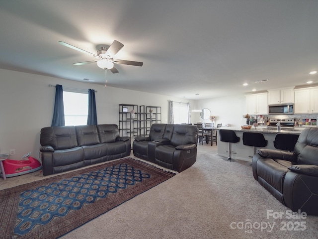 3322 Brighton Dr, Gastonia, NC 28052 - carpeted living area featuring ceiling fan and recessed lighting