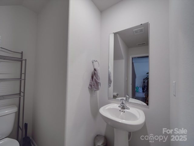 3322 Brighton Dr, Gastonia, NC 28052 - bathroom with toilet and a sink