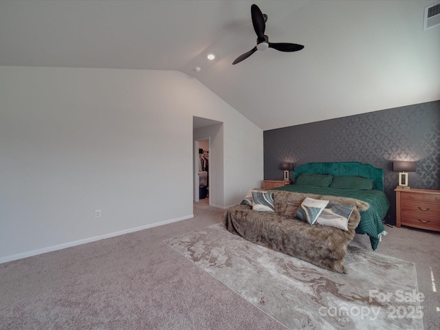 3322 Brighton Dr, Gastonia, NC 28052 - carpeted bedroom featuring lofted ceiling, a walk in closet, a ceiling fan, baseboards, and a closet