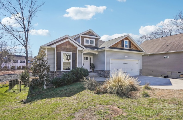 21610 Rio Oro Dr, Cornelius, NC 28031 - craftsman-style home featuring stone siding, concrete driveway, and a garage