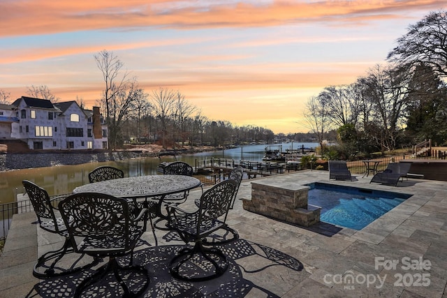 21610 Rio Oro Dr, Cornelius, NC 28031 - view of swimming pool featuring a patio and a water view