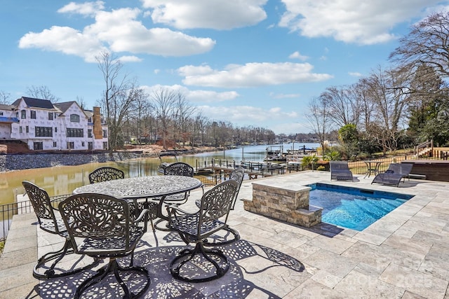 21610 Rio Oro Dr, Cornelius, NC 28031 - view of swimming pool with a patio area and a water view