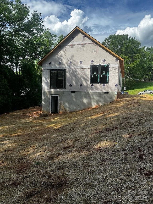 view of home's exterior featuring crawl space