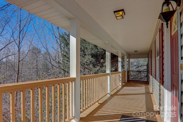 703 Cinnamon Way, Flat Rock, NC 28731 - wooden terrace with covered porch