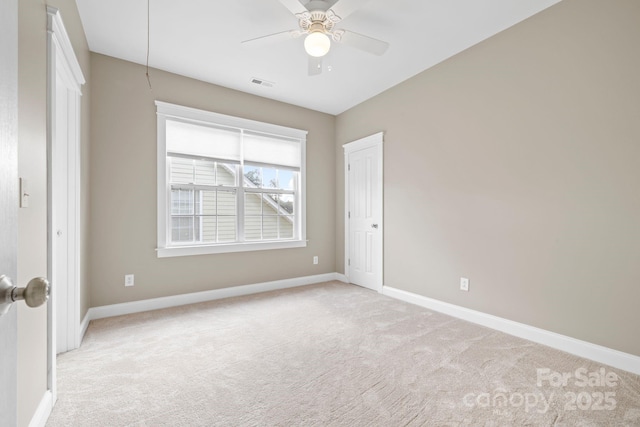 132 E Morehouse Ave, Mooresville, NC 28117 - empty room with light carpet, baseboards, and ceiling fan