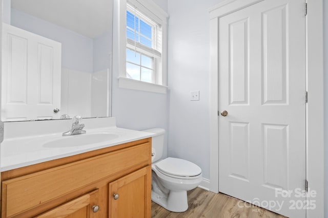 132 E Morehouse Ave, Mooresville, NC 28117 - bathroom featuring wood finished floors, vanity, and toilet