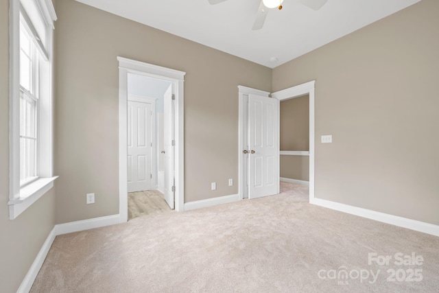132 E Morehouse Ave, Mooresville, NC 28117 - unfurnished bedroom featuring carpet flooring and baseboards