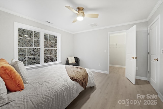 60 Leisure Ln, Maggie Valley, NC 28751 - bedroom with light wood-type flooring, baseboards, crown molding, and a ceiling fan