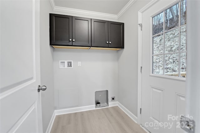 60 Leisure Ln, Maggie Valley, NC 28751 - laundry area with hookup for a washing machine, light wood-style flooring, hookup for an electric dryer, cabinet space, and plenty of natural light