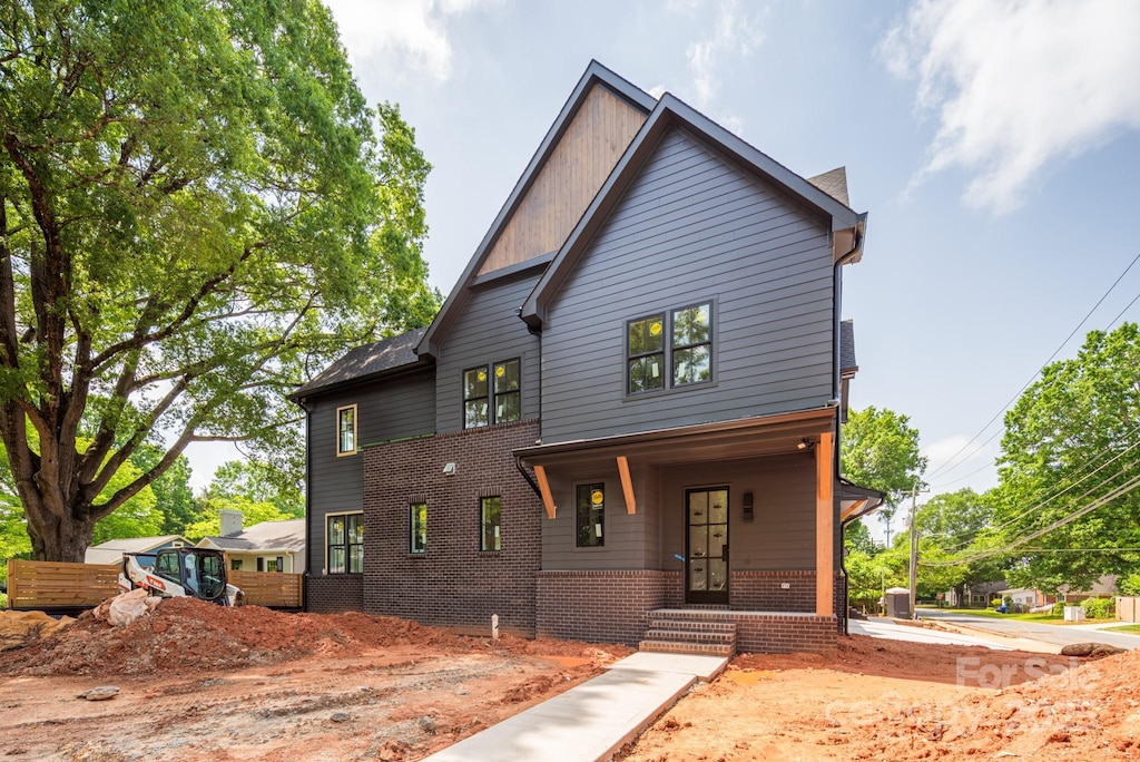 4900 Doris Ave, Charlotte, NC 28205 - view of front of home with brick siding and a porch