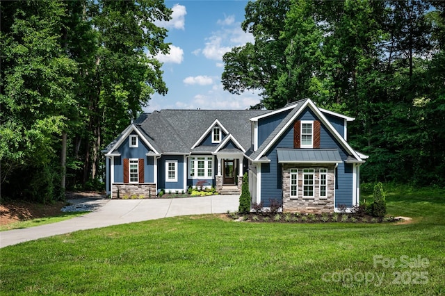 434 Breezewood Dr, Belmont, NC 28012 - craftsman inspired home featuring stone siding, a front yard, concrete driveway, a standing seam roof, and a metal roof