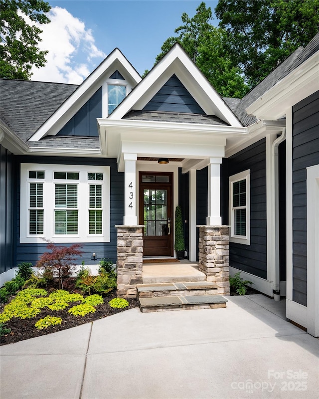 434 Breezewood Dr, Belmont, NC 28012 - view of exterior entry featuring roof with shingles and covered porch