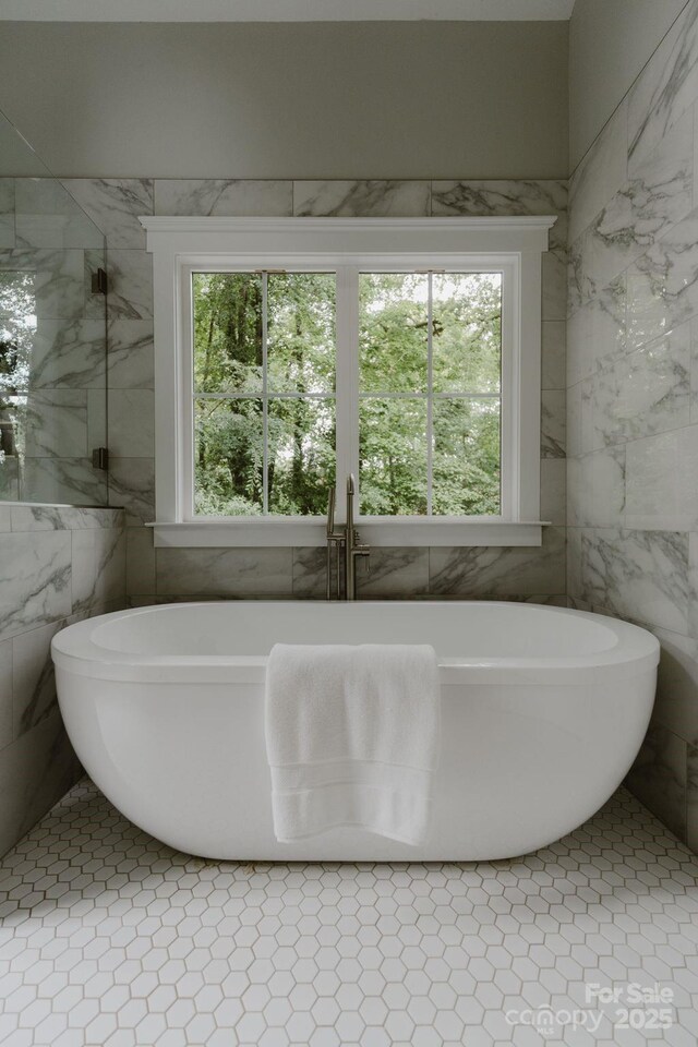 434 Breezewood Dr, Belmont, NC 28012 - full bathroom featuring tile walls, healthy amount of natural light, and a soaking tub