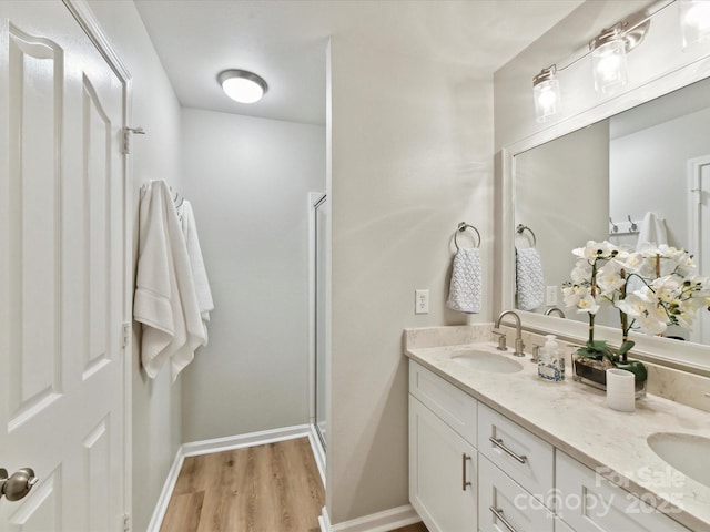2005 Grimley Ln, Fort Mill, SC 29707 - full bath with double vanity, wood finished floors, a stall shower, and baseboards