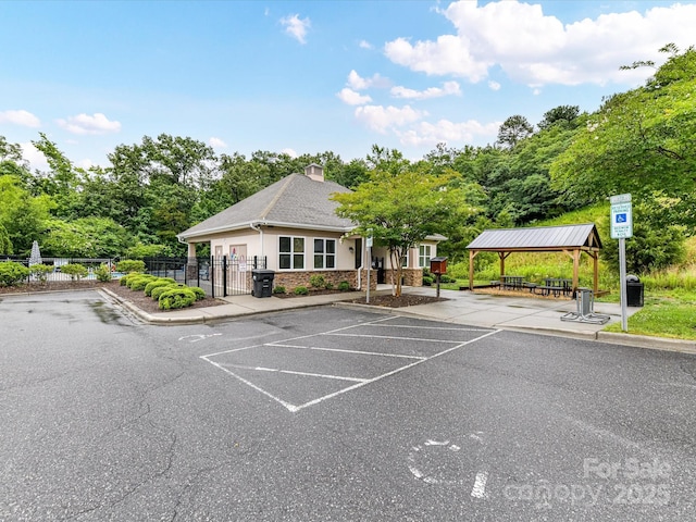 2005 Grimley Ln, Fort Mill, SC 29707 - uncovered parking lot featuring a gazebo and a gate