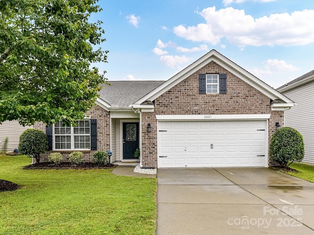 2005 Grimley Ln, Fort Mill, SC 29707 - single story home featuring brick siding, concrete driveway, a front yard, and an attached garage