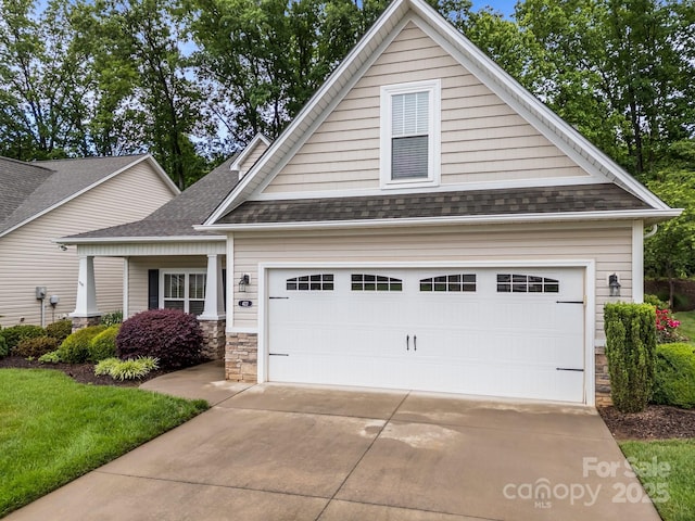 422 Drake Ln, Salisbury, NC 28146 - view of front of property featuring a shingled roof, stone siding, and driveway