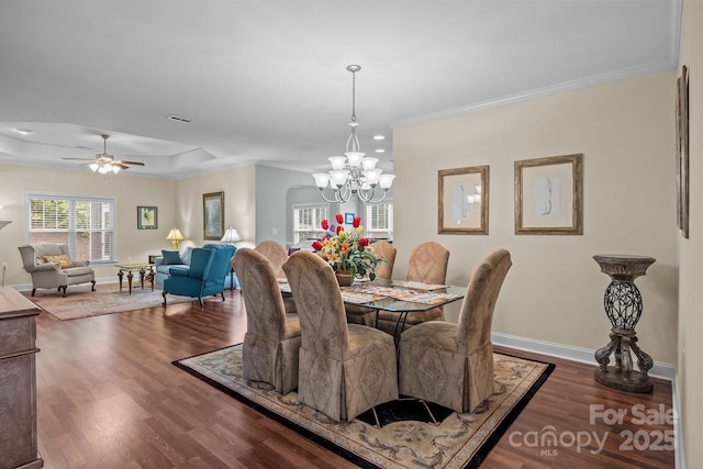 422 Drake Ln, Salisbury, NC 28146 - dining room featuring a chandelier, crown molding, wood finished floors, baseboards, and a ceiling fan