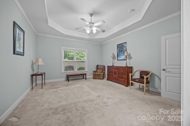 422 Drake Ln, Salisbury, NC 28146 - living area with a raised ceiling, carpet flooring, ceiling fan, baseboards, and ornamental molding